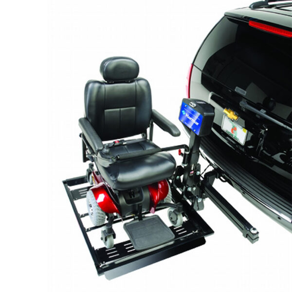 Extra-large Harmar AL560XL Powerchair Lift mounted on SUV, showing automatic hold-down arm and extended platform.