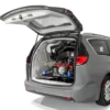 Compact Harmar AL6000 Inside Platform Lift installed in SUV, providing secure transport for powerchairs and scooters.