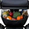 WHILL Model C2 Storage Basket, securely attached, providing extra storage for personal belongings.