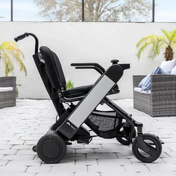 Cane Holder Kit securely attached to WHILL Model F, providing convenient cane storage for easy access.