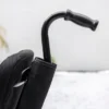 Cane Holder for Model F 5 Cane Holder Kit securely attached to WHILL Model F, providing convenient cane storage for easy access.