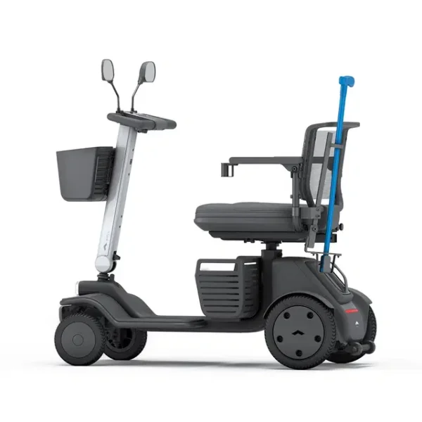 Cane Holder attached to the WHILL Model Ri, holding a cane securely for convenient access.