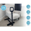 Stander Couch Cane beside a couch, showing the adjustable handle and organizer pouch for convenient support.