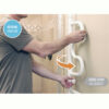 Curve Grab Bar with 360° rotating handle, offering four grip positions for safe transfers in any room.