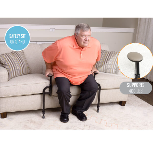 EZ Stand-N-Go Heavy Duty with dual handles and adjustable frame, providing stable support for safe transitions from couches and chairs.