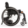 Empulse R90 Power Assist Device attached to a wheelchair, providing lightweight mobility support with a range of up to 9 miles.