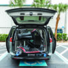 Harmar-RS65_AL600HD-1054_lpr Compact Harmar AL6000 Inside Platform Lift installed in SUV, providing secure transport for powerchairs and scooters.