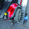 Harmar-RS73_AL600HD-1062_lpr Compact Harmar AL6000 Inside Platform Lift installed in SUV, providing secure transport for powerchairs and scooters.