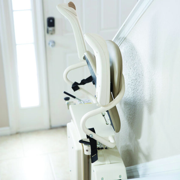 Harmar Pinnacle Stair Lift installed on a staircase, showing a compact and smooth operation for enhanced home mobility.