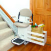 SL350AC_Installed_09_BasketWithGroceries – Copy_lpr Harmar SL350AC Stairlift installed indoors, showing a wide padded seat, adjustable footrest, and sturdy aluminum track.