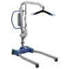 Hoyer Advance Patient Lift with lightweight aluminum frame, swan neck-style legs, and foldable design, shown navigating around a wheelchair.