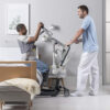 Invacare ISA 14 ISA Stand Assist Premier Series Lift with ergonomic handles and adjustable knee support, designed for safe, comfortable transfers.