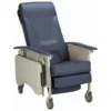 Invacre 3-way Recliner-Deluxe Invacare Deluxe Three-Position Recliner with ergonomic design, lumbar support, articulating headrest, and a fold-away tray, shown in a comfortable reclined position.