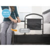 Mobility Bed Rail 5850-new-001 Stander Mobility Bed Rail with pivoting support handle, securely installed on a bed for safe transitions and fall protection.
