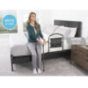 Mobility Bed Rail 5850-new-02 Stander Mobility Bed Rail with pivoting support handle, securely installed on a bed for safe transitions and fall protection.