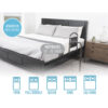 Mobility Bed Rail 5850-new-04 Stander Mobility Bed Rail with pivoting support handle, securely installed on a bed for safe transitions and fall protection.