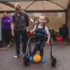 MyWay+ Gait Trainer Standard with a lightweight frame, dynamic trunk and pelvic support, and child-friendly colors.