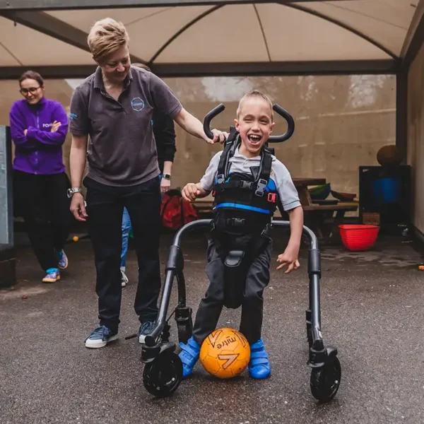 MyWay+ Gait Trainer Standard with a lightweight frame, dynamic trunk and pelvic support, and child-friendly colors.