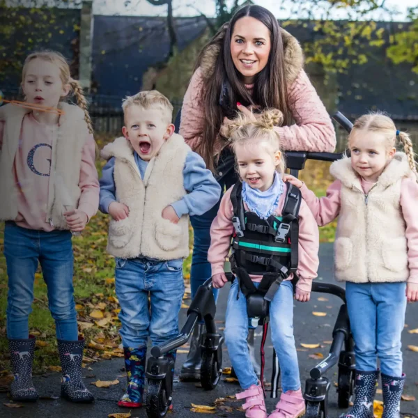 MyWay+ Gait Trainer Standard with a lightweight frame, dynamic trunk and pelvic support, and child-friendly colors.