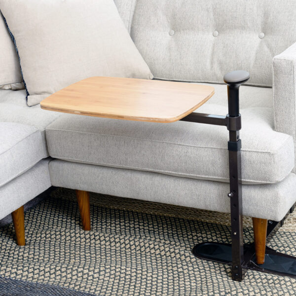 Omni Tray with 360° swivel tray and support handle, designed for easy access and stable support by chairs and sofas.