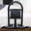 Stander Prime Safety Bed Handle attached to a bed, providing secure, compact support for safe bed transitions.