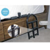 Stander Prime Safety Bed Handle attached to a bed, providing secure, compact support for safe bed transitions.