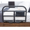 Stander Prime Safety Bed Rail with pivoting design, installed on a bed for extended bedside protection and easy access.