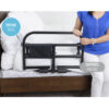 Stander Prime Safety Bed Rail with pivoting design, installed on a bed for extended bedside protection and easy access.