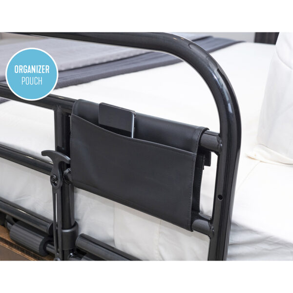 Stander Prime Safety Bed Rail with pivoting design, installed on a bed for extended bedside protection and easy access.