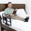 Stander Prime Safety Bed Rail with pivoting design, installed on a bed for extended bedside protection and easy access.