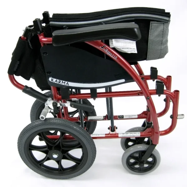 Lightweight S-Ergo 115 Transport Wheelchair with S-shaped ergonomic seat, foldable aluminum frame, and anti-bacterial upholstery.