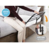 Stander 30” Safety Bed Rail attached to a bed, showing extended length and folding feature for added safety and convenience.