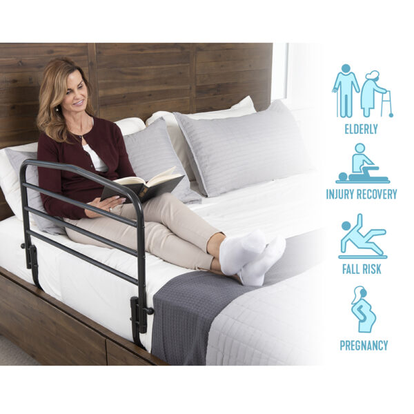 Stander 30” Safety Bed Rail attached to a bed, showing extended length and folding feature for added safety and convenience.