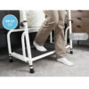 Stander Step with non-slip surface and rubber feet for stability, shown in use by a high bed.