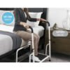 Stander Step with non-slip surface and rubber feet for stability, shown in use by a high bed.