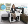 Stander Step with non-slip surface and rubber feet for stability, shown in use by a high bed.