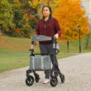 Triumph Maverick Rollator with a lightweight frame, ergonomic handles, and built-in seat, designed for easy mobility and comfortable rest.
