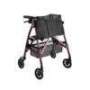 Wonder Rollator Plus with padded seat, large wheels, and storage basket for reliable mobility and stability.