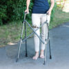 Wonder Walker Lite, lightweight and foldable, designed for easy navigation in tight spaces with ergonomic handles and adjustable height.