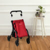 Essentials Shopping Rollator Essentials Shopping Rollator with large storage bag, padded seat, rear basket, and front swivel wheel, designed for lightweight, easy mobility.