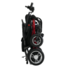 Forcemech Carbon F1 folding power chair with carbon fiber frame, compact design, and lightweight build.