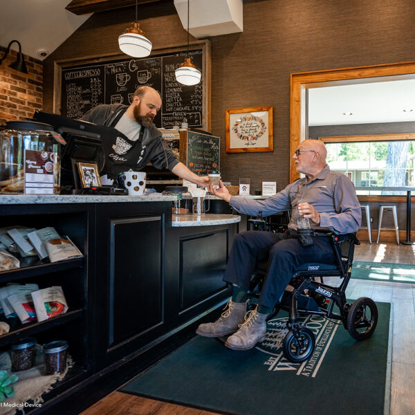 Jazzy Ultra Light Power Chair with an all-carbon fiber frame, ultra-lightweight design, and quick-folding capability for travel-friendly mobility.