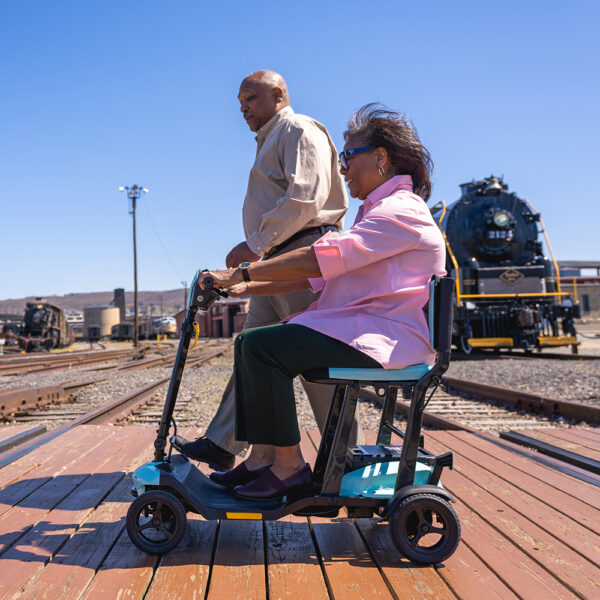 Go Go Super Portable Scooter with compact folding design, lightweight frame, and Charge360 magnetic charging system for travel-friendly mobility.
