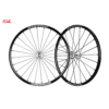 Spinergy SPOX Sport (SL) wheels with 24 PBO fiber spokes, optimized for speed and lightweight performance, shown on a sports wheelchair.