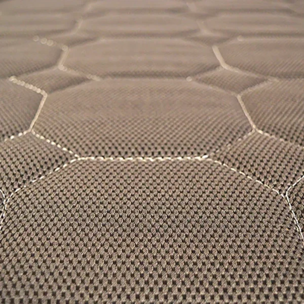 UPbed Standard motorized lift bed with memory foam mattress and padded bedrails.