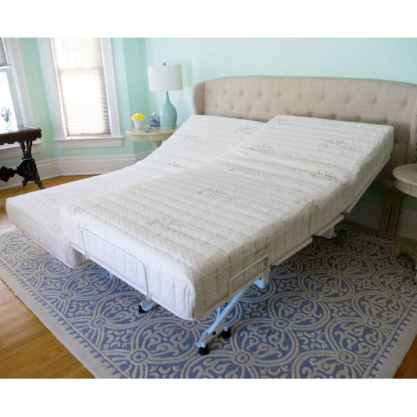 The New Valiant Hospital Bed with head and foot articulation, Trendelenburg adjustability, and optional bamboo rail covers and egress lighting.