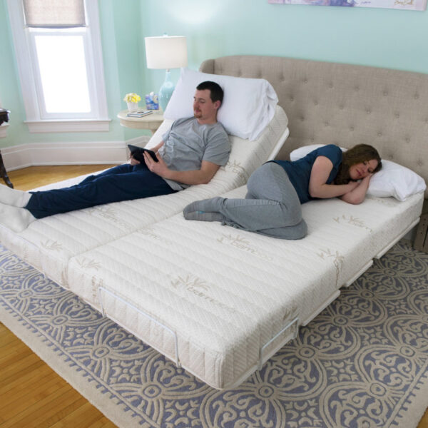 The New Valiant Hospital Bed with head and foot articulation, Trendelenburg adjustability, and optional bamboo rail covers and egress lighting.