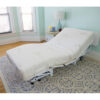 The New Valiant Hospital Bed with head and foot articulation, Trendelenburg adjustability, and optional bamboo rail covers and egress lighting.