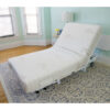 The New Valiant Hospital Bed with head and foot articulation, Trendelenburg adjustability, and optional bamboo rail covers and egress lighting.