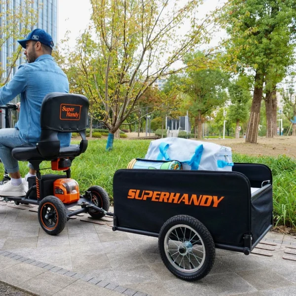 Explorer Mobility Scooter in black and orange, sturdy frame, pneumatic tires, ergonomic handlebars, and control panel for easy operation.